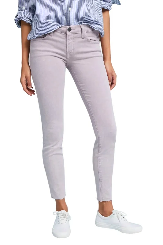 women's high-waisted skinny jeans -The Stiletto Skinny Stretch Raw Hem Jean In Purple